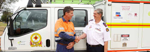 STRENGTHENING TIES: Kestrel Mine general manager operations John Coughlan and SES local controller George Thomson. cont STRENGTHENING TIES: Kestrel Mine general manager operations John Coughlan and SES local controller George Thomson. cont